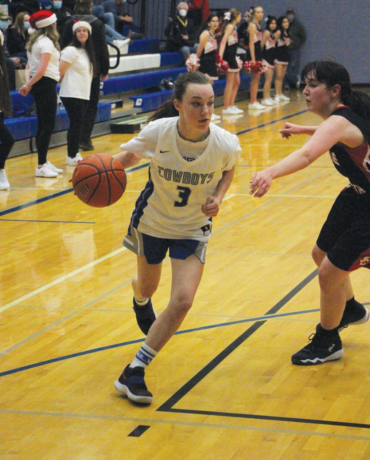 EJ Freshman Kay Botkin dribbles to the bucket in the first half.